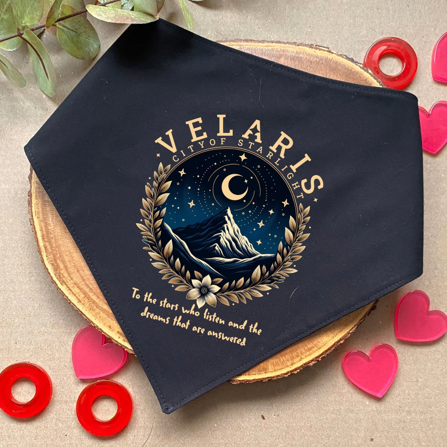 Clip-on dog bandana inspired by fantasy, romantic, and romance books – easy to wear and perfect for book-loving pet owners who want to add a touch of literary charm to their dog’s style.