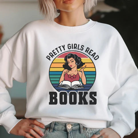 Smart girls read spicy books – crewneck for fantasy fans with brains and sass.