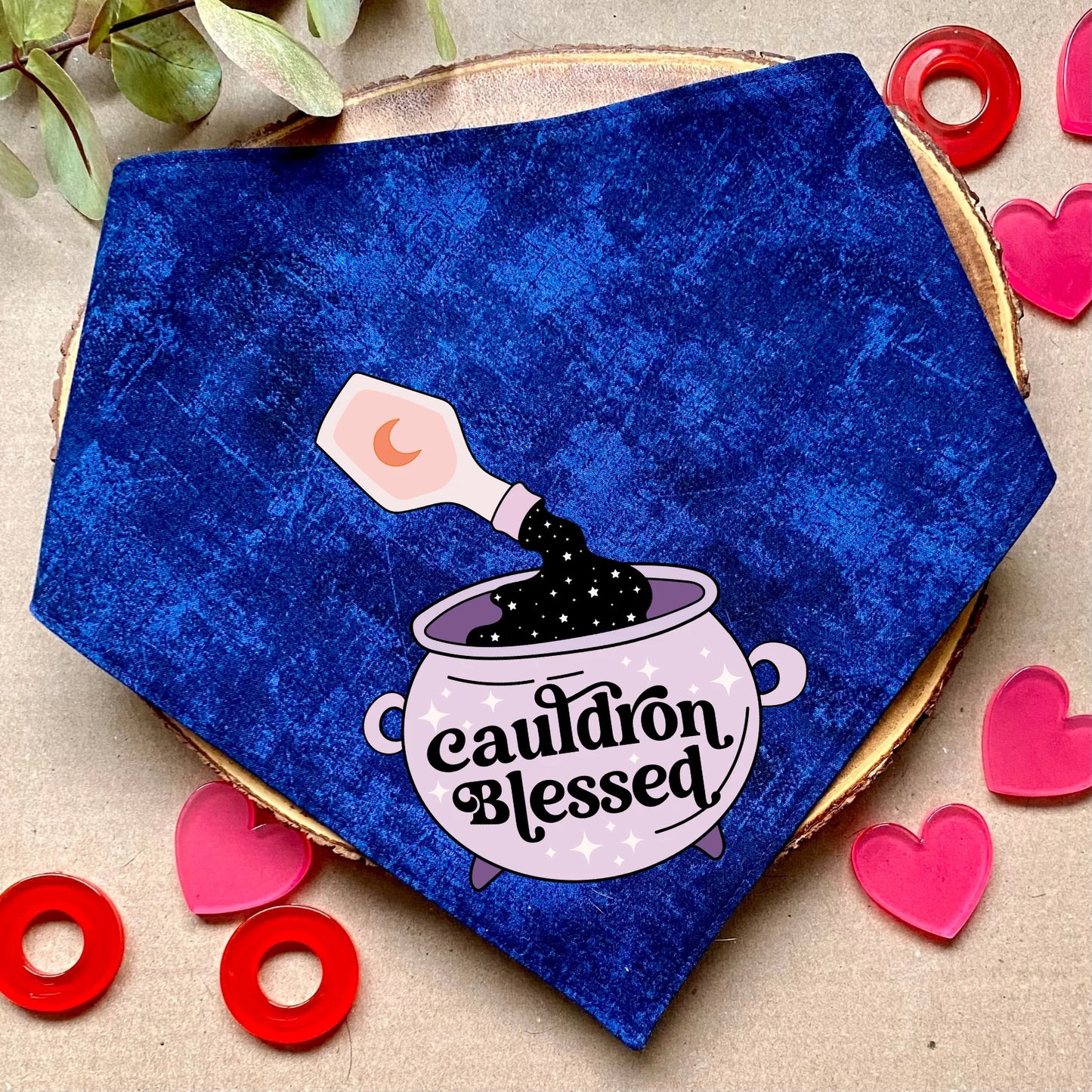 Clip-on dog bandana inspired by fantasy, romantic, and romance books – easy to wear and perfect for book-loving pet owners who want to add a touch of literary charm to their dog’s style.