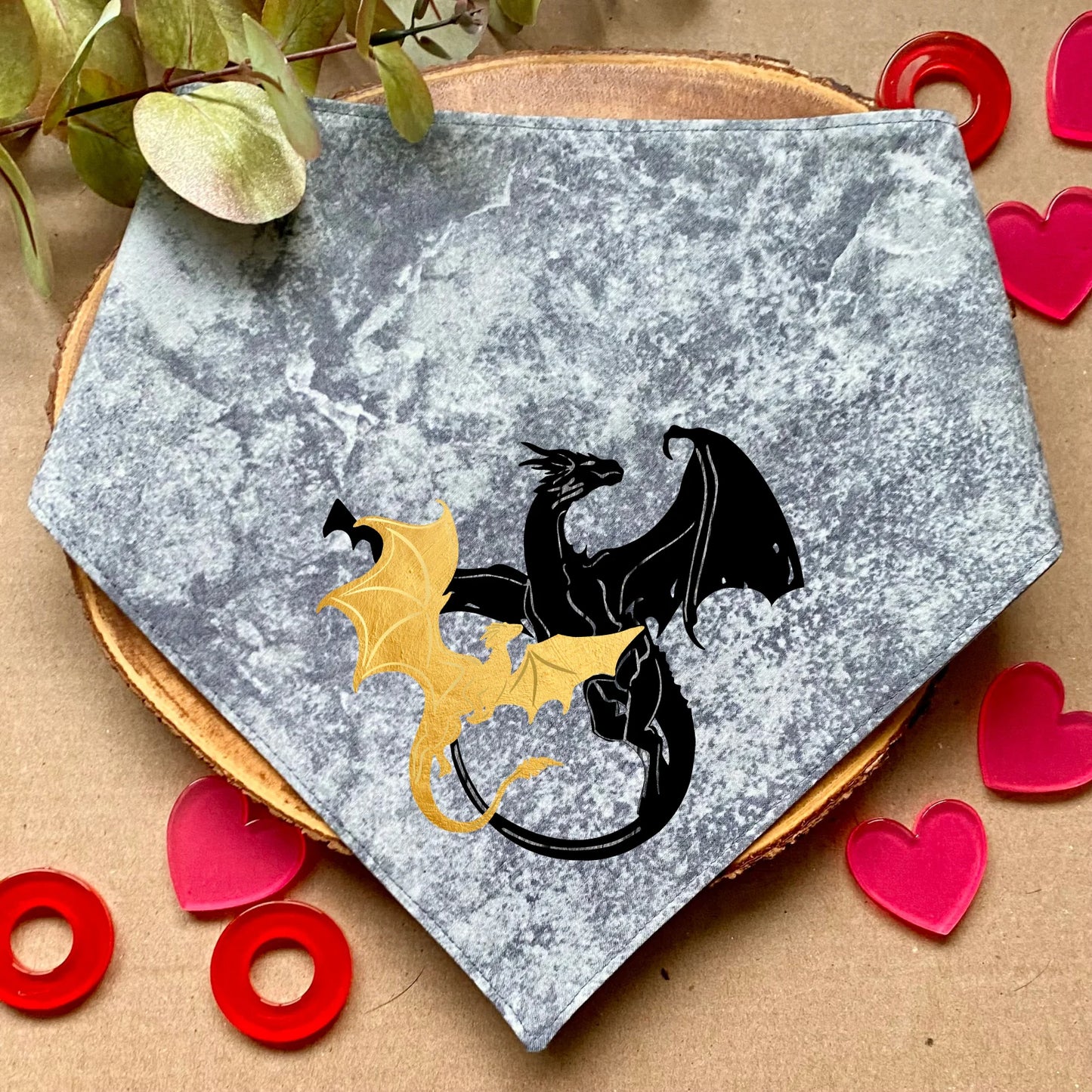 Clip-on dog bandana inspired by fantasy, romantic, and romance books – easy to wear and perfect for book-loving pet owners who want to add a touch of literary charm to their dog’s style.