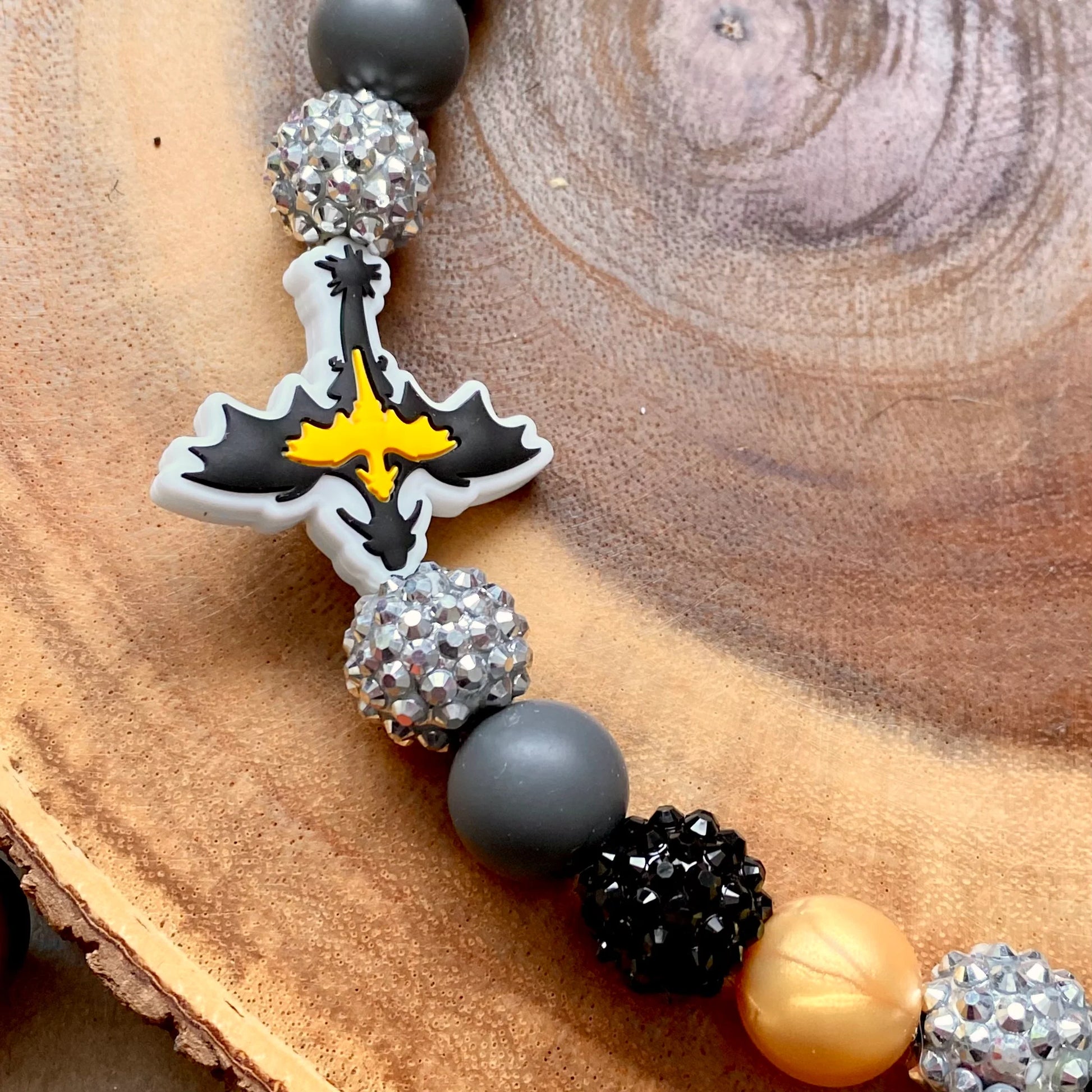 Zoomed in Fourth Wing-inspired silicone beaded dog collar made from durable, food-grade silicone – stylish and functional for everyday use or decorative wear, perfect for fantasy book lovers and their pets. 