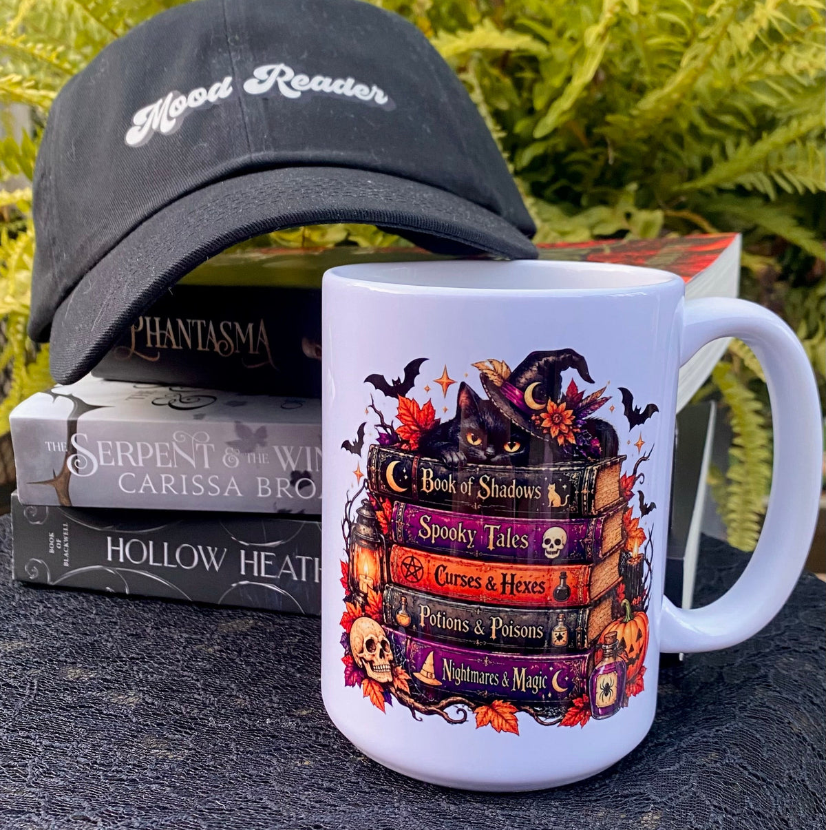StoryBoundBox Spooky Bookstack Mug 15oz featuring a haunted book design, ceramic mug perfect for spooky season drinks.
